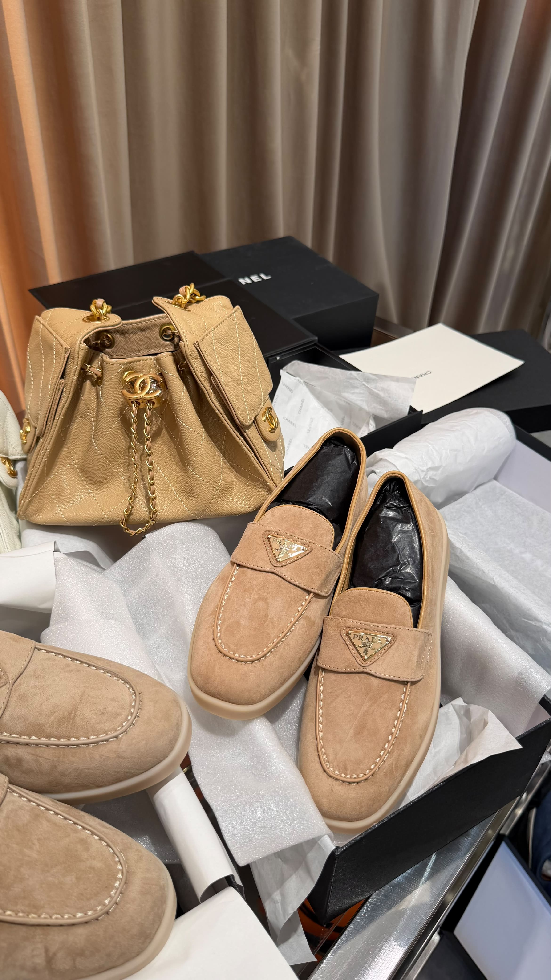 Prada Loafers and Chanel Bag